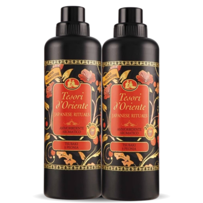Two black bottles from Tesori d'Oriente Japanese Rituals fragrance with red labels and gold floral detailing (Tsubaki e Peonia).